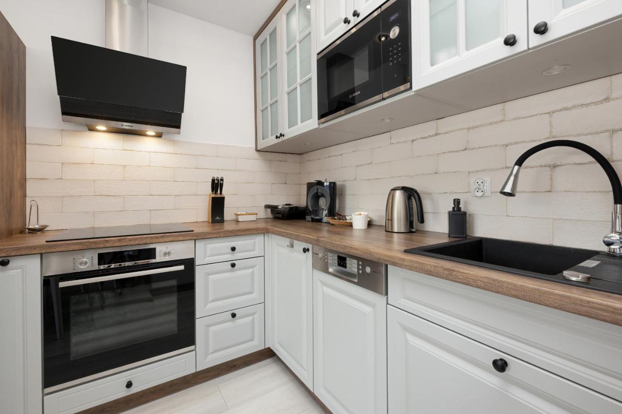 Apartamenty Polnocna By Noclegi Renters Darlowo Bagian luar foto